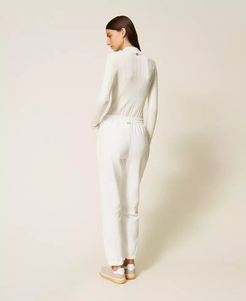 Pantaloni joggers in maglia e felpa Twinset