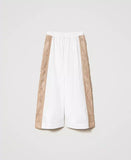 Pantaloni cropped con bande in macramè Twinset